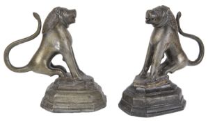A near pair of late 19th /early 20th c. Indian patinated bronze lions