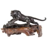 A good late 19th c. Japanese Meiji period bronze sculpture of a tiger attacking an alligator