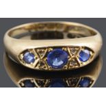 An 18ct gold sapphire gypsy ring, Birm. 1913