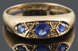 An 18ct gold sapphire gypsy ring, Birm. 1913