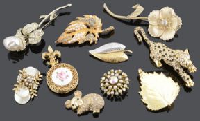 A collection of contemporary costume brooches