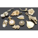 A collection of contemporary costume brooches