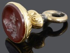A Georgian carved carnelian intaglio pendant fob seal