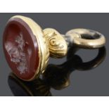 A Georgian carved carnelian intaglio pendant fob seal