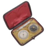 A 19th c. brass Fr. pocket barometer, thermometer and compass travelling compendium