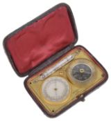 A 19th c. brass Fr. pocket barometer, thermometer and compass travelling compendium