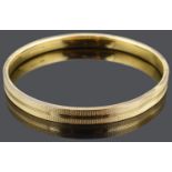 A 1920's 9ct gold slave bangle,