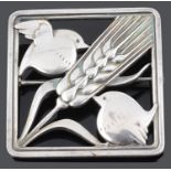 A Georg Jensen silver brooch designed by Arno Milanowski