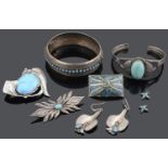 A collection of Navajo silver and turquoise jewellery