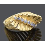 A striking Continental .750 gold and sapphire set ring
