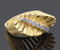 A striking Continental .750 gold and sapphire set ring