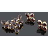 A large Victorian garnet set brooch and matching earrings