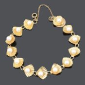 A continental cultured pearl set scallop shell bracelet