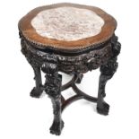 A late 19th c. Chinese export rosewood circular occasional table