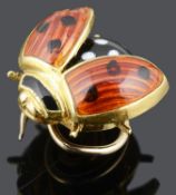 A charming 18ct gold and enamel ladybird pin by Berndt Munsteiner