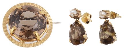 An 18ct gold mounted circular smoky quartz set brooch and a similar pair of drop earrings