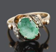 A Continental emerald and diamond set scroll dress ring