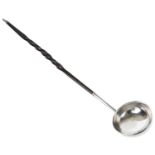 A Georgian style white metal and twisted baleen handle toddy ladle with white metal collar.
