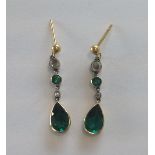 A pair of attractive Edwardian rose diamond and emerald paste ear drops