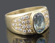 A contemporary Continental aquamarine and diamond set dress ring