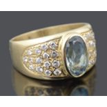 A contemporary Continental aquamarine and diamond set dress ring