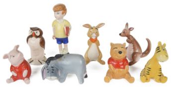 A Beswick set of Winnie the Pooh figurines