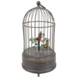 An early 20th c. continental singing bird in a cage automaton