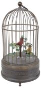 An early 20th c. continental singing bird in a cage automaton