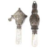 A George VI novelty silver and mother of pearl babies rattle; one other