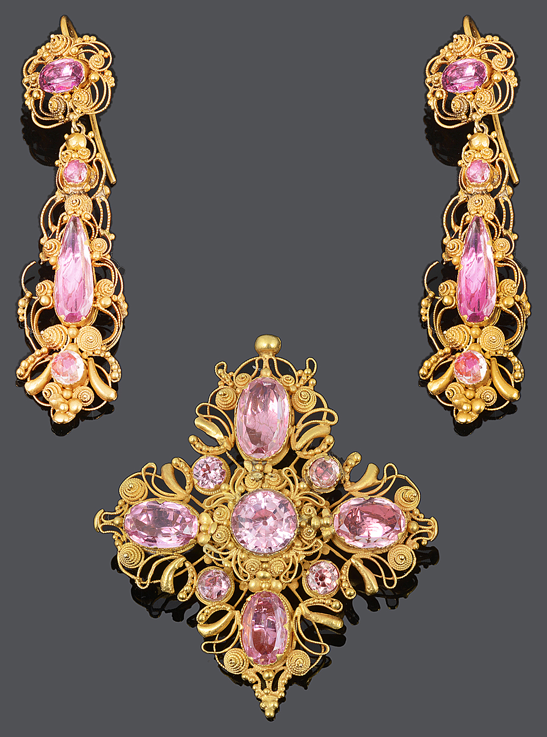An attractive early 19th c. pink foiled topaz brooch and drop earrings