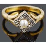 An attractive Edwardian cultured pearl and diamond set ring