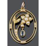 An Attractive Edwardian aquamarine and seed pearl floral pendant
