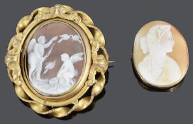 A Victorian ornate carved cameo brooch and another