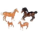 Four Beswick horses