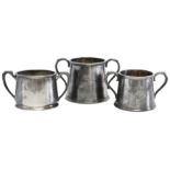 Three silver-plated twin handled sugar bowls, 20th c.,