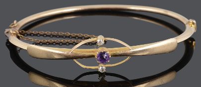 A delicate late Victorian 15ct gold amethyst and diamond set bangle