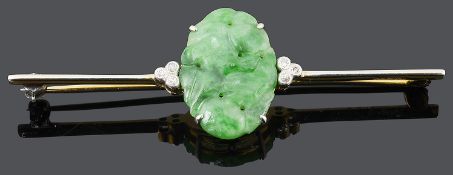 An Art Deco carved green jade and diamond set bar brooch