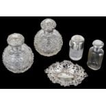 A selection of Victorian silver capped glass scent bottle and a silver trinket tray