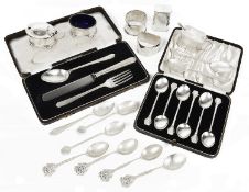 A collection of George V and later silver, condiments, coffee spoons, napkin rings, teaspoons