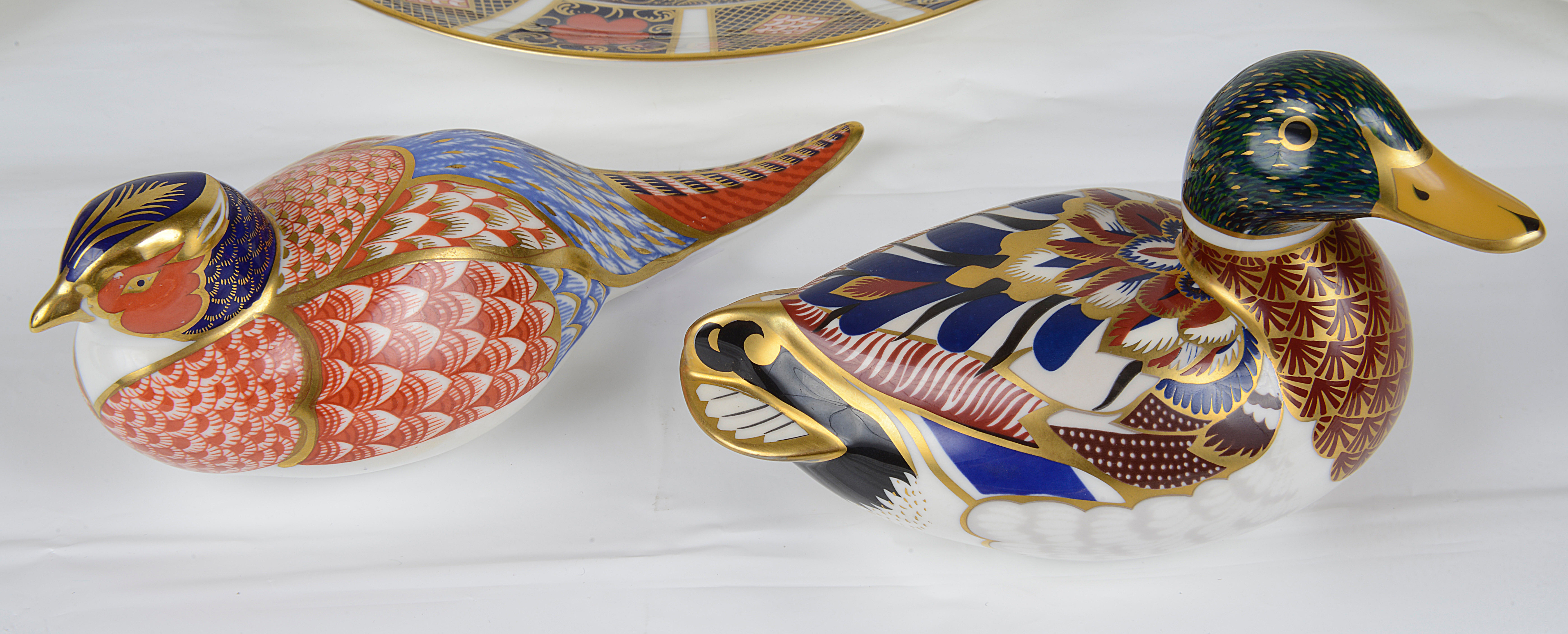 Two Royal Crown Derby Imari bird paperweights, three Imari plates and a trinket dish - Image 4 of 4