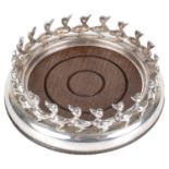 A modern silver wine bottle coaster by Links of London