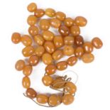 A quantity of butterscotch amber beads