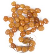 A quantity of butterscotch amber beads