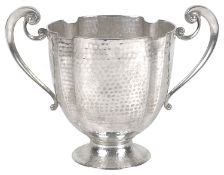 A George V Arts and Crafts silver twin handled cup, London 1912 by Henry Hodson Plante