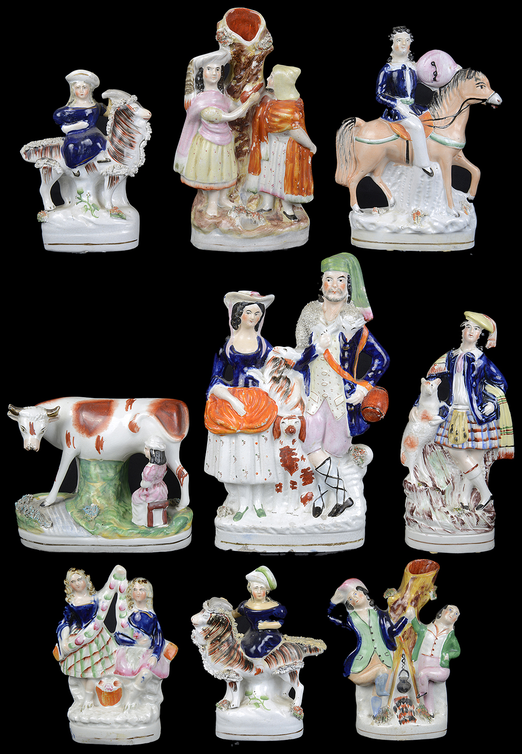 A collection of nine 19th c. Staffordshire pottery figures