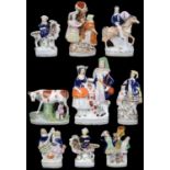 A collection of nine 19th c. Staffordshire pottery figures