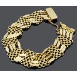 An eastern 18ct gold honeycomb panel bracelet