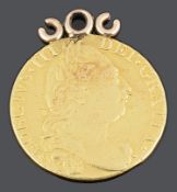 A George III gold guinea 1779, with pendant loop attachment