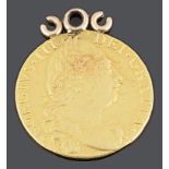 A George III gold guinea 1779, with pendant loop attachment