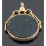 A George V 9ct gold mounted oval blood stone swivel pendant fob